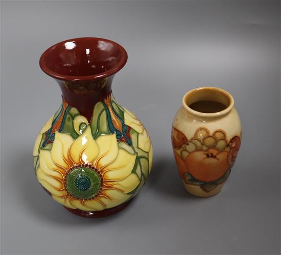 A Moorcroft sunflower vase and a bird and apple vase tallest 16cm